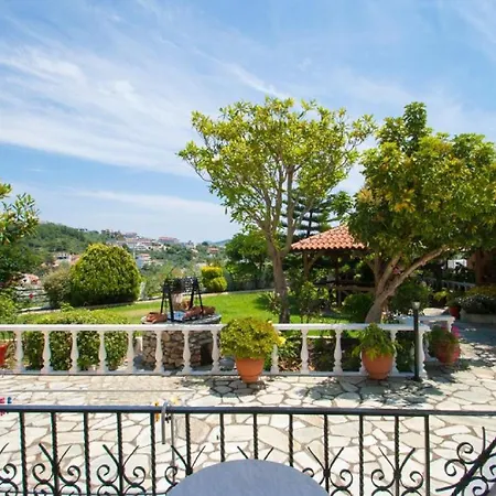 Olga شاطئ ميغالي أموس